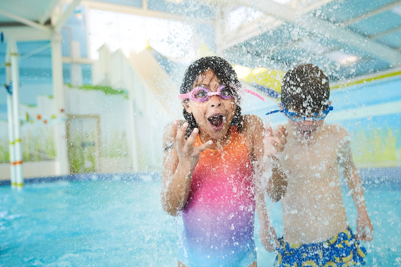 Family enjoying swimming pool